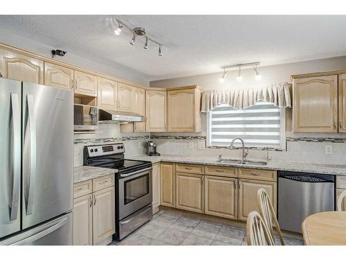 414 Sierra Madre Court Sw, Calgary, AB - Indoor Photo Showing Kitchen With Double Sink