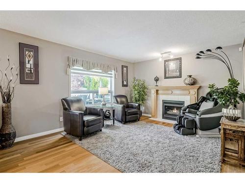 414 Sierra Madre Court Sw, Calgary, AB - Indoor Photo Showing Living Room With Fireplace