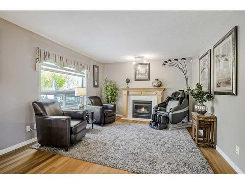 414 Sierra Madre Court Sw, Calgary, AB - Indoor Photo Showing Living Room With Fireplace