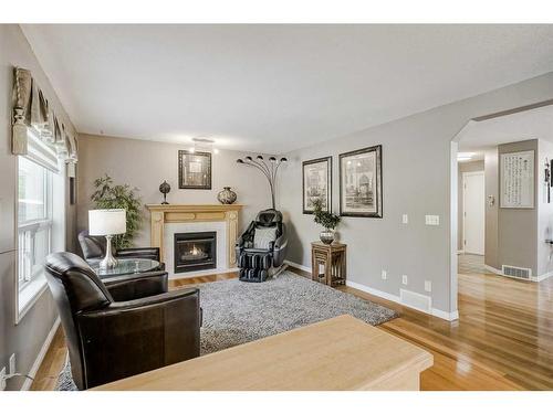 414 Sierra Madre Court Sw, Calgary, AB - Indoor Photo Showing Living Room With Fireplace