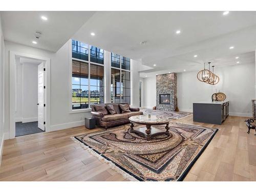 580 Marine Drive Se, Calgary, AB - Indoor Photo Showing Other Room With Fireplace