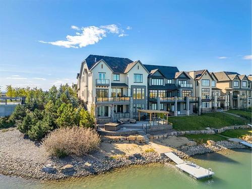 580 Marine Drive Se, Calgary, AB - Outdoor With Body Of Water With Balcony With Facade