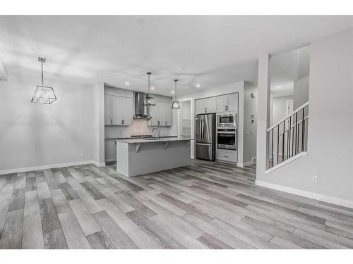 157 Belmont Villas Sw, Calgary, AB - Indoor Photo Showing Kitchen With Upgraded Kitchen