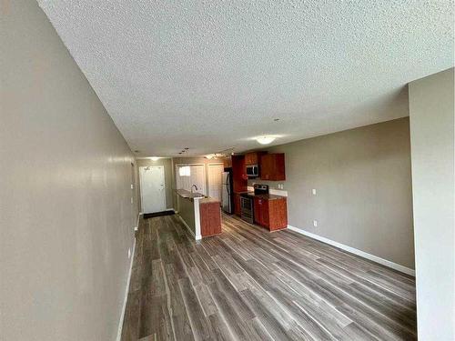 2103-700 Willowbrook Road Nw, Airdrie, AB - Indoor Photo Showing Other Room