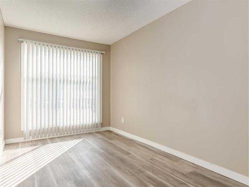 2103-700 Willowbrook Road Nw, Airdrie, AB - Indoor Photo Showing Other Room