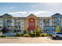 2103-700 Willowbrook Road Nw, Airdrie, AB  - Outdoor With Balcony With Facade 