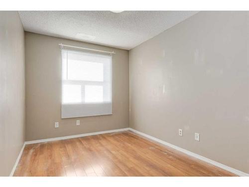 2103-700 Willowbrook Road Nw, Airdrie, AB - Indoor Photo Showing Other Room