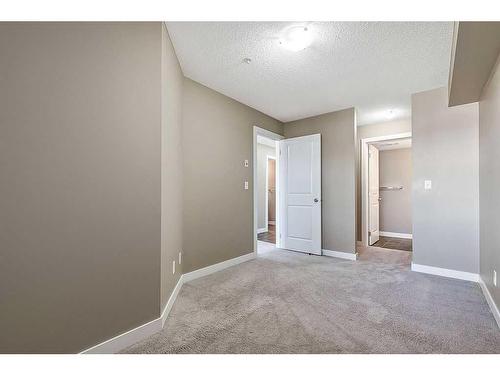 1310-81 Legacy Boulevard Se, Calgary, AB - Indoor Photo Showing Other Room