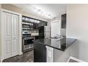 1310-81 Legacy Boulevard Se, Calgary, AB  - Indoor Photo Showing Kitchen With Stainless Steel Kitchen With Double Sink With Upgraded Kitchen 