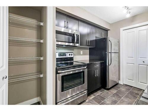 1310-81 Legacy Boulevard Se, Calgary, AB - Indoor Photo Showing Kitchen With Stainless Steel Kitchen