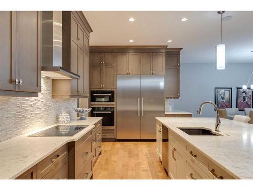 107 Mystic Ridge Park Sw, Calgary, AB - Indoor Photo Showing Kitchen With Stainless Steel Kitchen With Upgraded Kitchen