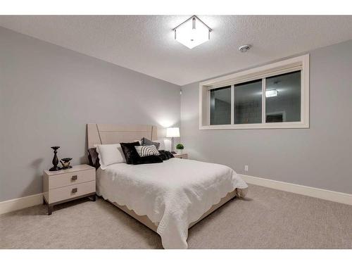 107 Mystic Ridge Park Sw, Calgary, AB - Indoor Photo Showing Bedroom