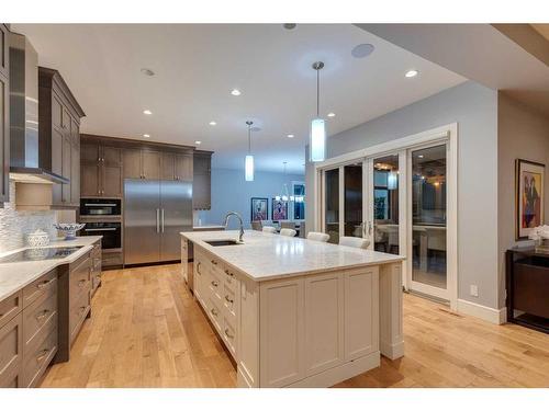 107 Mystic Ridge Park Sw, Calgary, AB - Indoor Photo Showing Kitchen With Stainless Steel Kitchen With Upgraded Kitchen