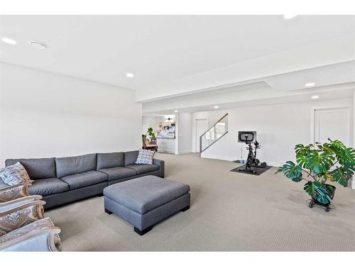 653 Quarry Way Se, Calgary, AB - Indoor Photo Showing Living Room