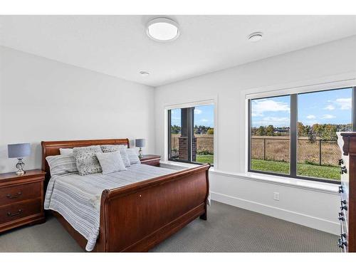 653 Quarry Way Se, Calgary, AB - Indoor Photo Showing Bedroom