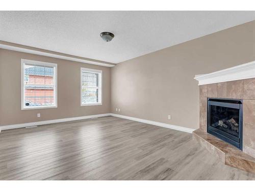 37 Taralake Terrace Ne, Calgary, AB - Indoor Photo Showing Living Room With Fireplace