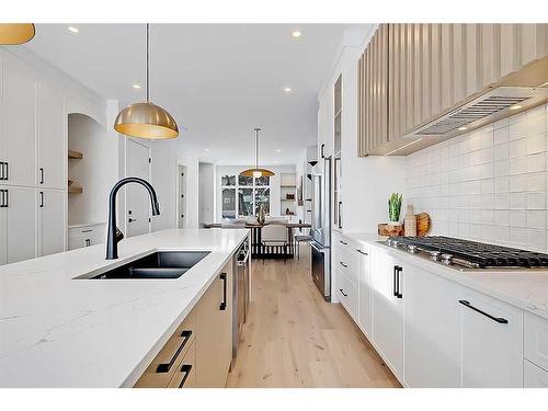 2033 32 Avenue Sw, Calgary, AB - Indoor Photo Showing Kitchen With Double Sink With Upgraded Kitchen