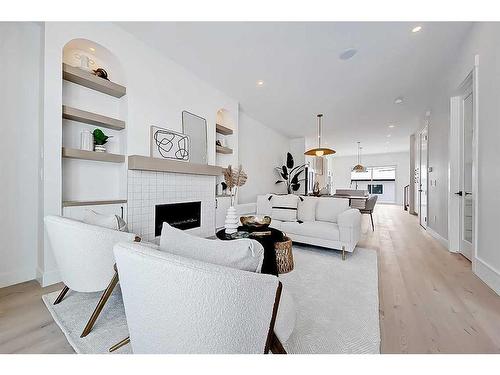 2033 32 Avenue Sw, Calgary, AB - Indoor Photo Showing Living Room With Fireplace