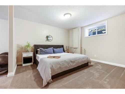 99 Bridleridge Crescent Sw, Calgary, AB - Indoor Photo Showing Bedroom