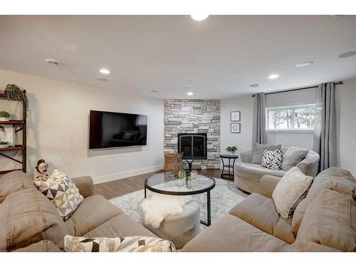 322078 8 Street East, Rural Foothills County, AB - Indoor Photo Showing Living Room With Fireplace