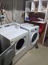 120A Queensland Drive Se, Calgary, AB  - Indoor Photo Showing Laundry Room 