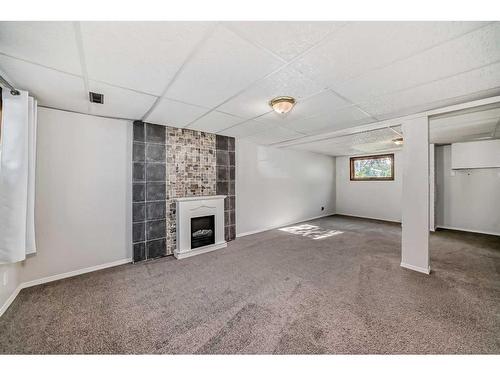 27 Barner Avenue, Red Deer, AB - Indoor With Fireplace