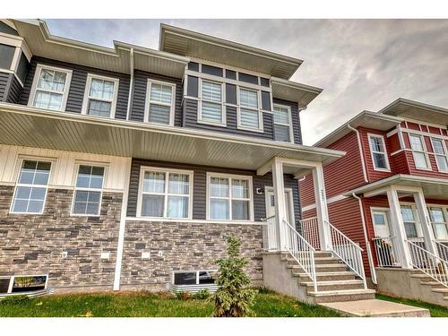 257 Dawson Way, Chestermere, AB - Outdoor With Facade