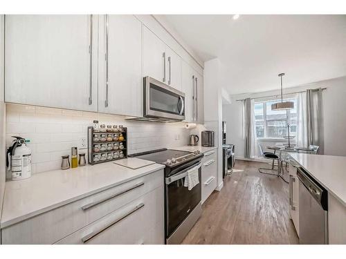 257 Dawson Way, Chestermere, AB - Indoor Photo Showing Kitchen With Stainless Steel Kitchen With Upgraded Kitchen