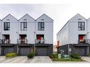 7024 34 Avenue Nw, Calgary, AB  - Outdoor With Balcony With Facade 