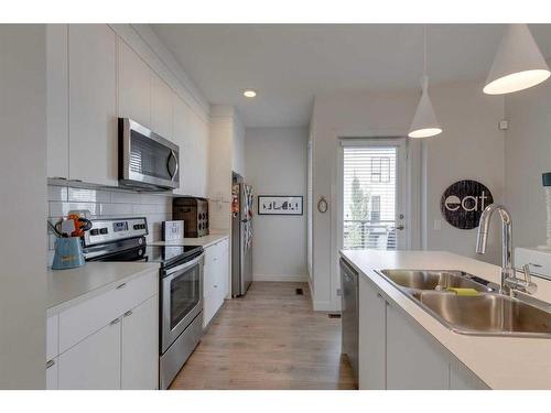 7024 34 Avenue Nw, Calgary, AB - Indoor Photo Showing Kitchen With Double Sink