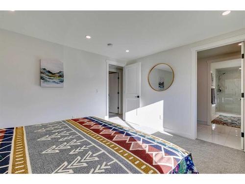 1128 Lake Sylvan Drive Se, Calgary, AB - Indoor Photo Showing Bedroom