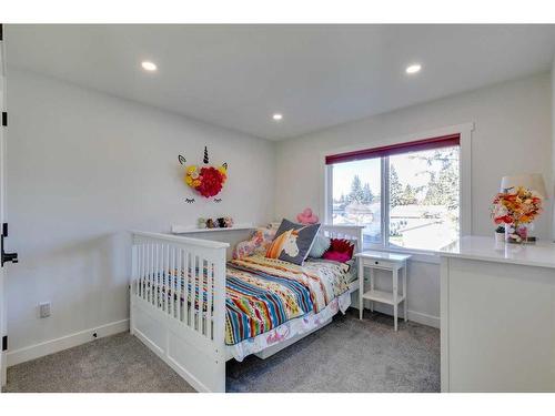 1128 Lake Sylvan Drive Se, Calgary, AB - Indoor Photo Showing Bedroom