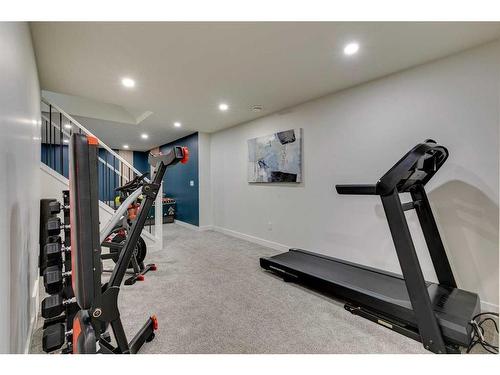 1128 Lake Sylvan Drive Se, Calgary, AB - Indoor Photo Showing Gym Room