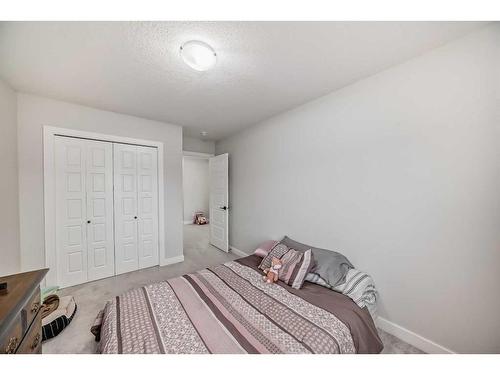 162 Ambleton Drive Nw, Calgary, AB - Indoor Photo Showing Bedroom