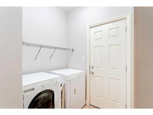 109 Panamount Road Nw, Calgary, AB - Indoor Photo Showing Laundry Room