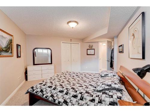 109 Panamount Road Nw, Calgary, AB - Indoor Photo Showing Bedroom