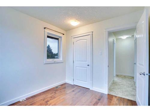 4-6147 Buckthorn Road Nw, Calgary, AB - Indoor Photo Showing Other Room