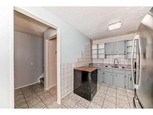 522 43 Street Se, Calgary, AB - Indoor Photo Showing Kitchen With Double Sink