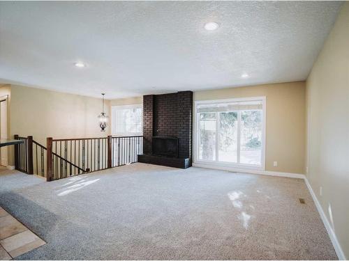 572 Parkridge Drive Se, Calgary, AB - Indoor With Fireplace