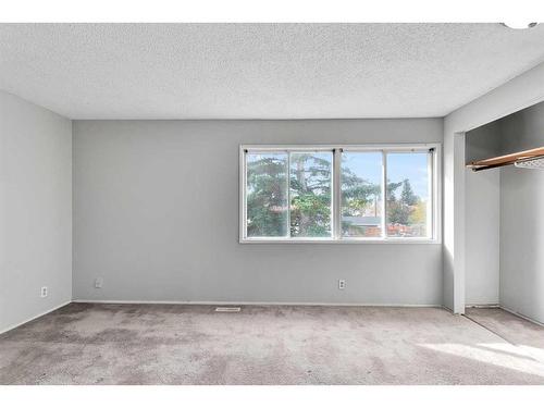 231 Sandstone Road Nw, Calgary, AB - Indoor Photo Showing Other Room