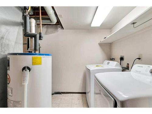 231 Sandstone Road Nw, Calgary, AB - Indoor Photo Showing Laundry Room