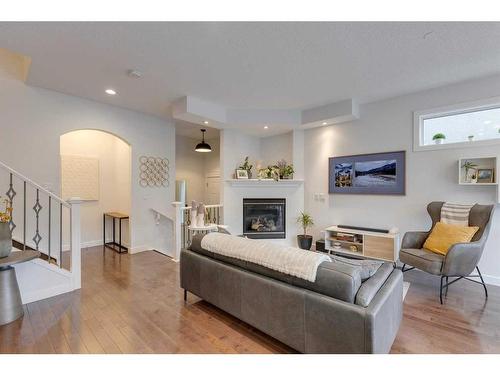 2-528 34 Street Nw, Calgary, AB - Indoor Photo Showing Living Room With Fireplace