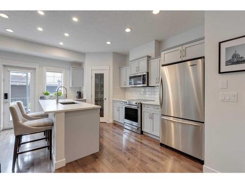 2-528 34 Street Nw, Calgary, AB - Indoor Photo Showing Kitchen With Stainless Steel Kitchen