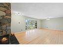 796 Acadia Drive Se, Calgary, AB  - Indoor Photo Showing Living Room With Fireplace 