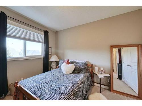 14 Riviera Point, Cochrane, AB - Indoor Photo Showing Bedroom