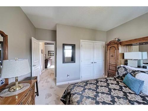 14 Riviera Point, Cochrane, AB - Indoor Photo Showing Bedroom