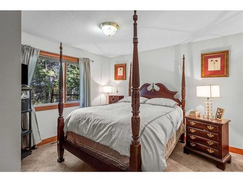 20 Pinewood, Canmore, AB - Indoor Photo Showing Bedroom