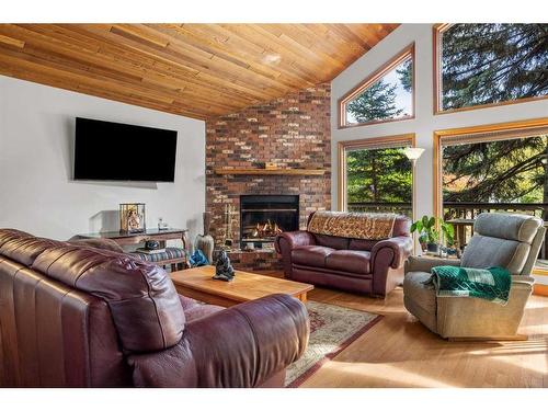 20 Pinewood, Canmore, AB - Indoor Photo Showing Living Room With Fireplace