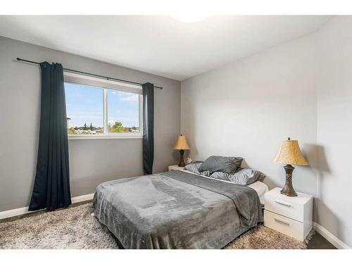 216 Taradale Drive Ne, Calgary, AB - Indoor Photo Showing Bedroom