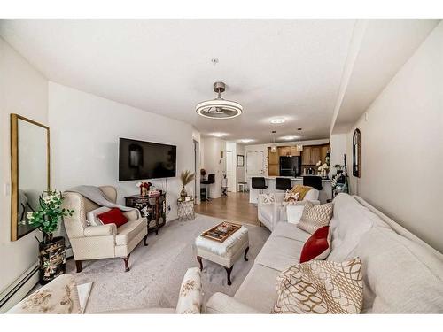 101-380 Marina Drive, Chestermere, AB - Indoor Photo Showing Living Room